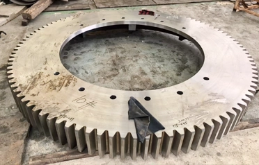 Wo finden Sie einen One-Stop-Service für die kundenspezifische Bearbeitung großer Zahnkränze und nicht standardmäßiger mechanischer Teile auf der Grundlage Ihrer Zeichnungen? Tangshan Yuexin Machinery bietet eine zuverlässige Lösung.